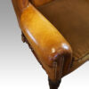 Pair of leather William and Mary wing chairs arm