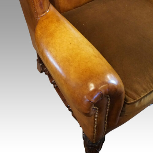 Pair of leather William and Mary wing chairs arm