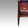 19thc. mahogany library chair front leg