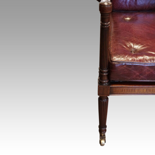 19thc. mahogany library chair front leg