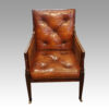 Antique mahogany bergere library chair