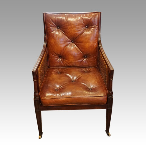 Antique mahogany bergere library chair