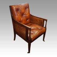 Antique mahogany bergere library chair angle