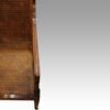 Antique mahogany bergere library chair arm