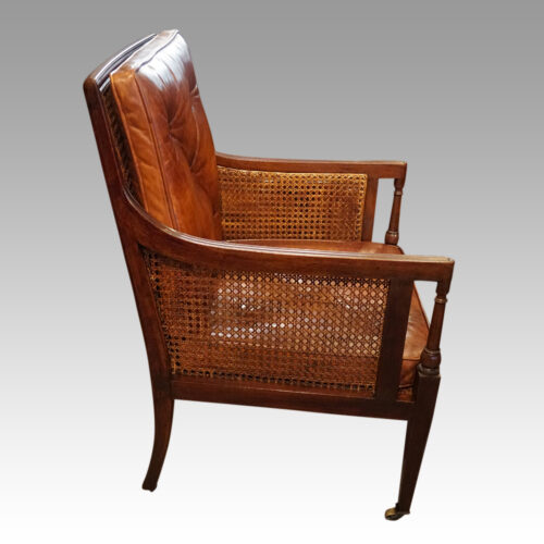 Antique mahogany bergere library chair side