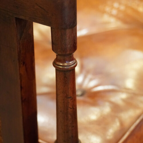 Antique mahogany bergere library chair upright arm