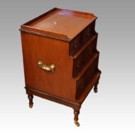 Pair Georgian style bedside chests at angle