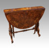 Victorian inlaid walnut Sutherland table at angle