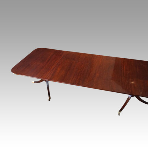 Antique mahogany twin pillar dining table side angle