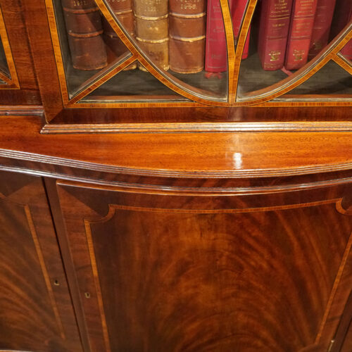 George V mahogany breakfront bookcase bow top