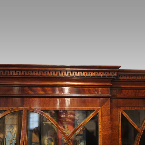 George V mahogany breakfront bookcase cornice