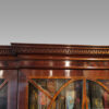 George V mahogany breakfront bookcase top cornice