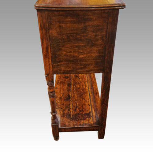 Georgian oak potboard dresser end view
