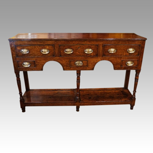 Georgian oak potboard dresser front