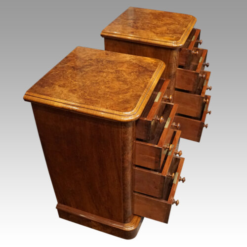 Pair of Victorian burr walnut bedside chests drawers open