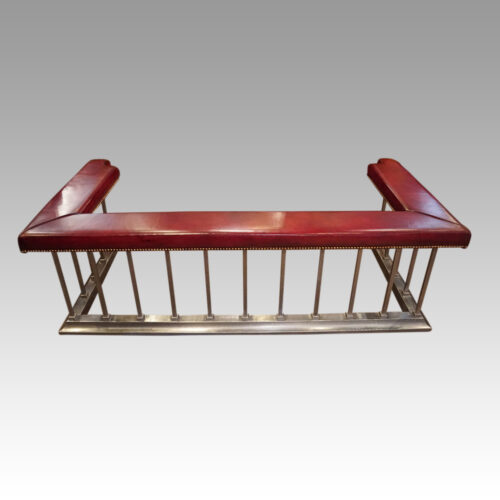 Steel and red leather club fender