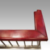 Steel and red leather club fender top corner