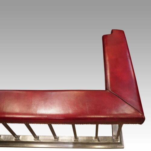Steel and red leather club fender top corner