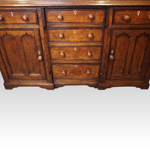 Antique oak Gothic kitchen dresser base front