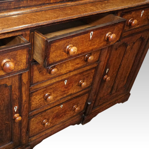 Antique oak Gothic kitchen dresser drawer open