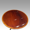Mahogany extending cross banded dining table circular top