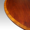 Mahogany extending cross banded dining table edge