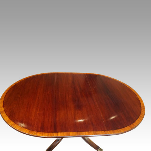 Mahogany extending cross banded dining table open