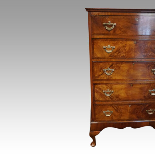 Tall walnut chest detail view