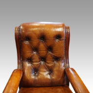 Victorian lions head easy chair button back