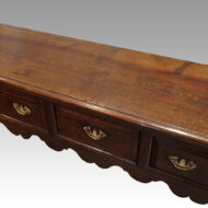 Antique cabriole leg dresser base top detail