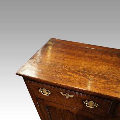 Antique oak dog kennel dresser top corner