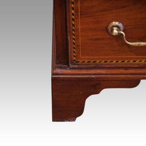 Edwardian tall narrow mahogany chest foot