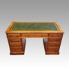 Edwardian walnut pedestal desk front