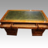 Edwardian walnut pedestal desk top drawers