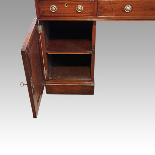 Georgian mahogany partners desk door open
