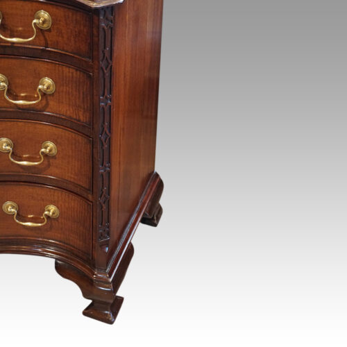 Georgian style mahogany serpentine chest blind fret
