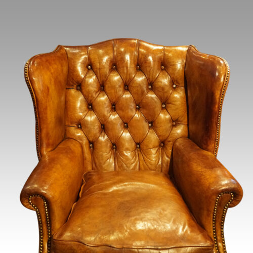 Leather button back wingchair back