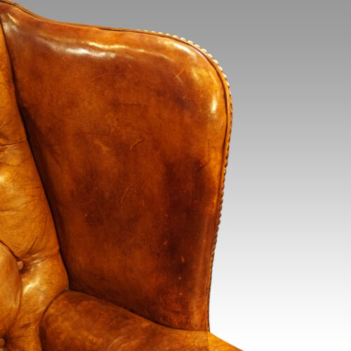 Leather button back wingchair headrest