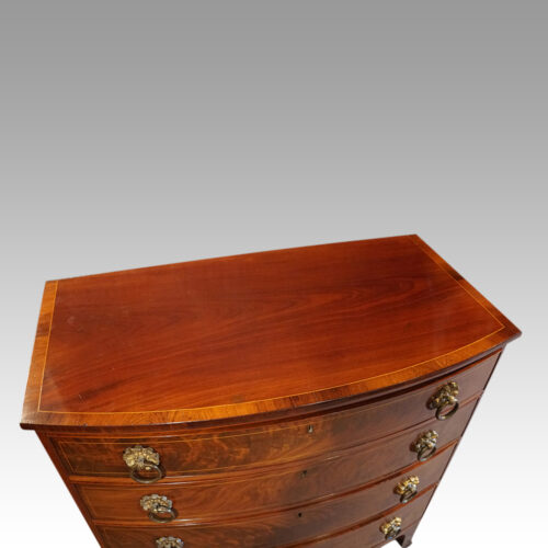 Regency mahogany bow front chest top
