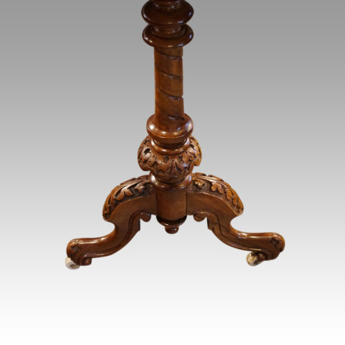 Victorian inlaid walnut centre table end supports