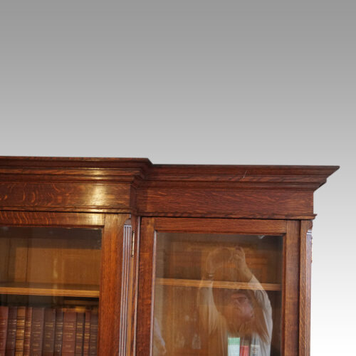 Edwardian oak breakfront bookcase cornice