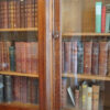 Edwardian oak breakfront bookcase door name