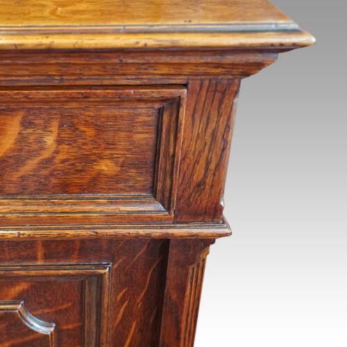 Edwardian oak breakfront bookcase drawer detail
