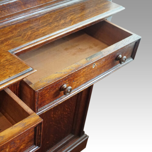 Edwardian oak breakfront bookcase drawer lining
