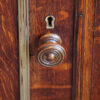 Edwardian oak breakfront bookcase knob close up