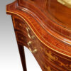 Edwardian serpentine inlaid display cabinet edge