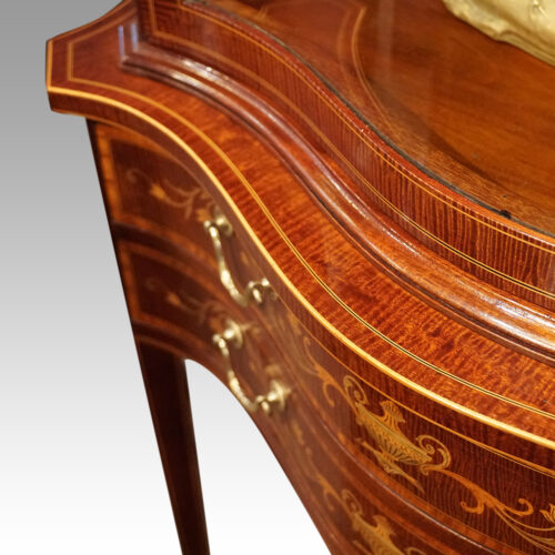 Edwardian serpentine inlaid display cabinet edge