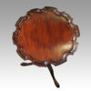 Pair of mahogany wine tables top detail