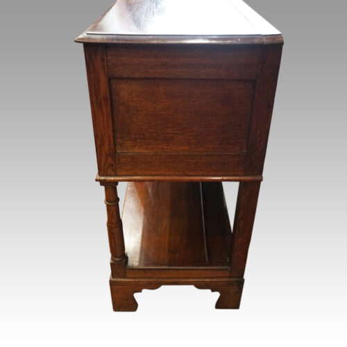 Antique oak dresser base side