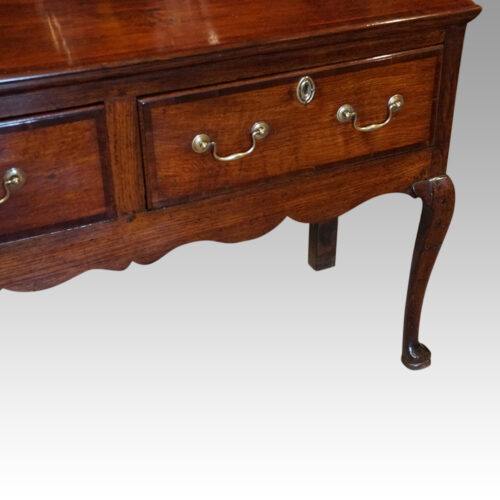 George III oak cabriole leg dresser base drawer detail